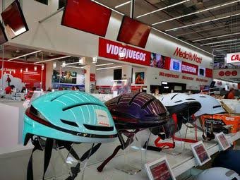 Bicycle helmets displayed in electronics store