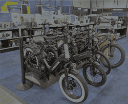 E-bikes showcased on blue carpet